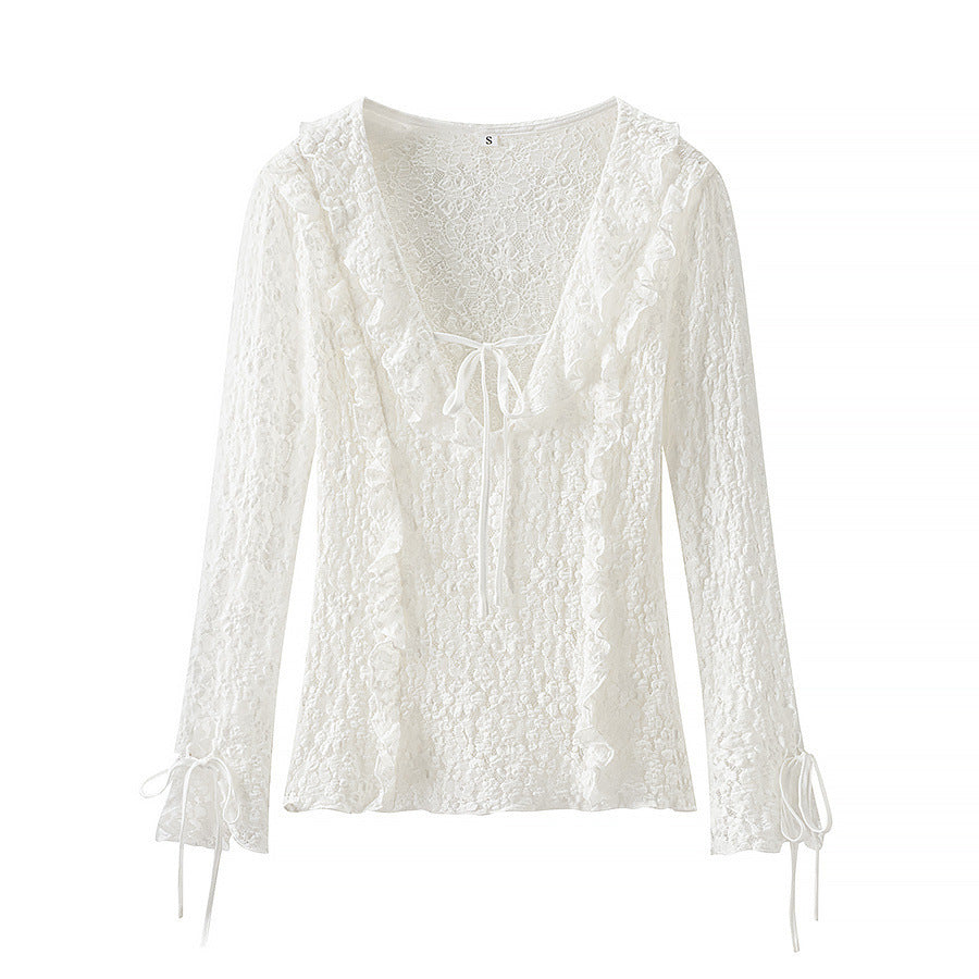 Ladies figure-hugging lace blouse with ruffle V-neck and tie detail Mune Fashion