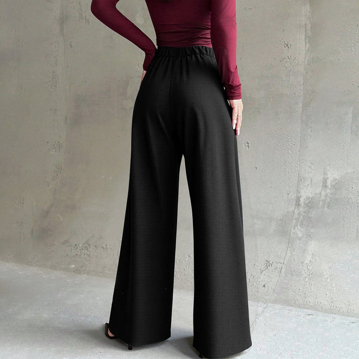 Ladies elegant wide Palazzo trousers with pressed crease and high-cut waist Mune Fashion