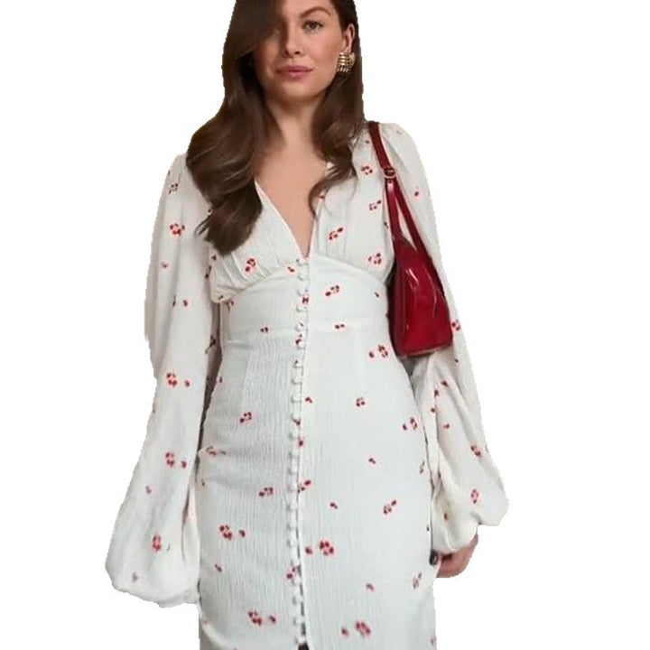 Ladies midi dress with puff sleeves, V-neckline and decorative button placket Mune Fashion