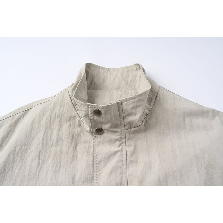 Unisex Short Jacket in minimalist Workwear look with high stand-up collar and snap button closure Mune Fashion