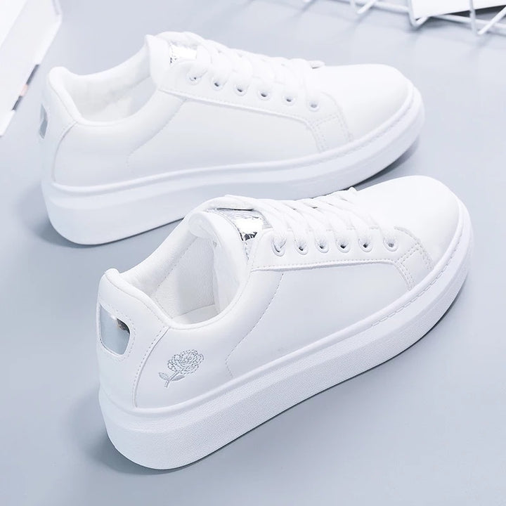 Women's casual urban sneakers with subtle rose embroidery, elevated wedge sole profile and padded comfort insole Mune Fashion