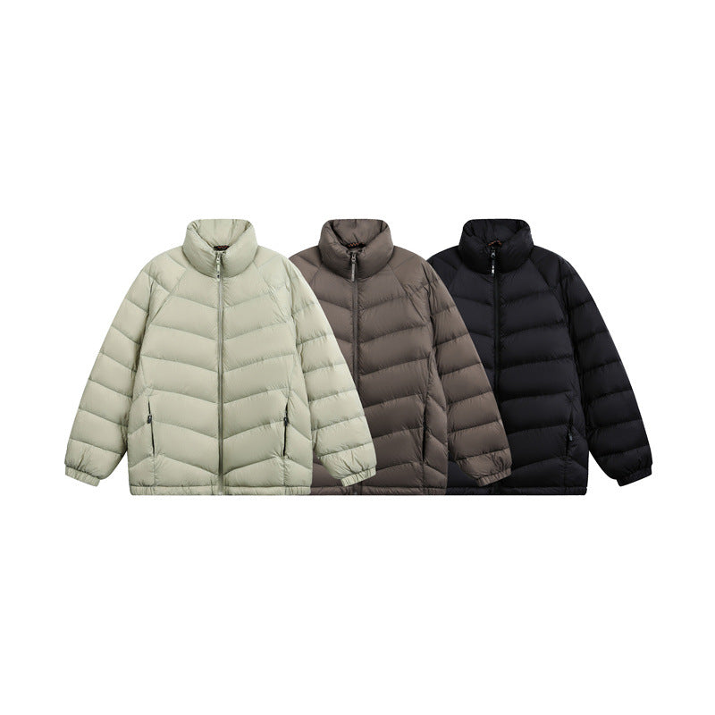 Unisex Short cut padded jacket in boxy fit with chevron quilting and high collar Mune Fashion