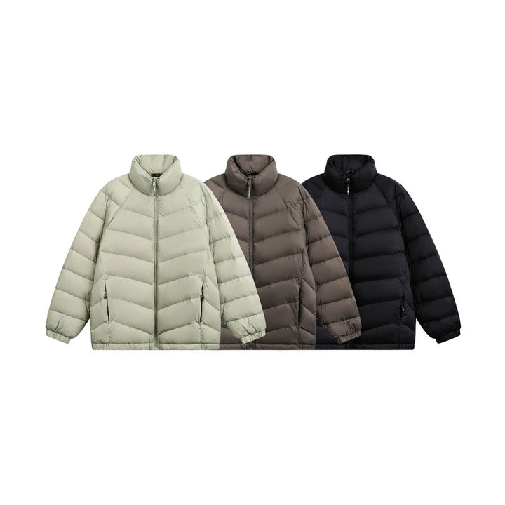 Unisex Short cut padded jacket in boxy fit with chevron quilting and high collar Mune Fashion