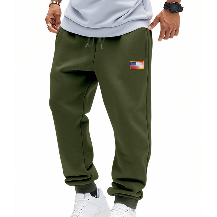 Men's trendy joggers with elastic drawstring waistband, ribbed cuffs, and discreet flag application Mune Fashion