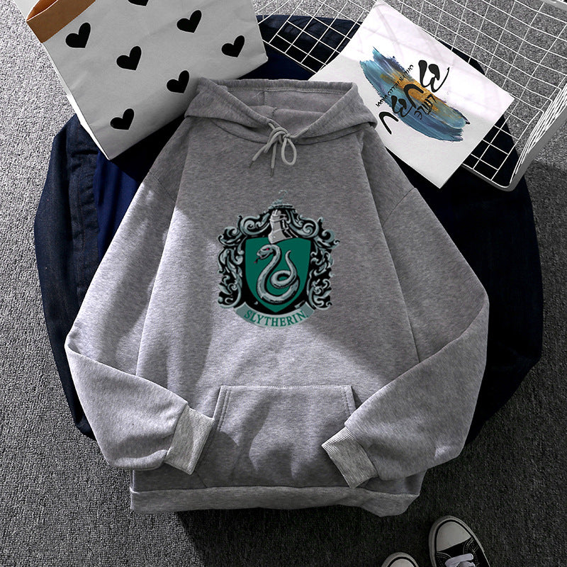 Women's oversized hooded sweatshirt with heraldic snake emblem and soft fleece lining Mune Fashion