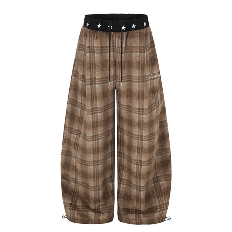 Women's Extra Wide Checked Palazzo Lounge Pants made of soft fleece with star-embellished comfort waistband, drawstring and adjustable hem.