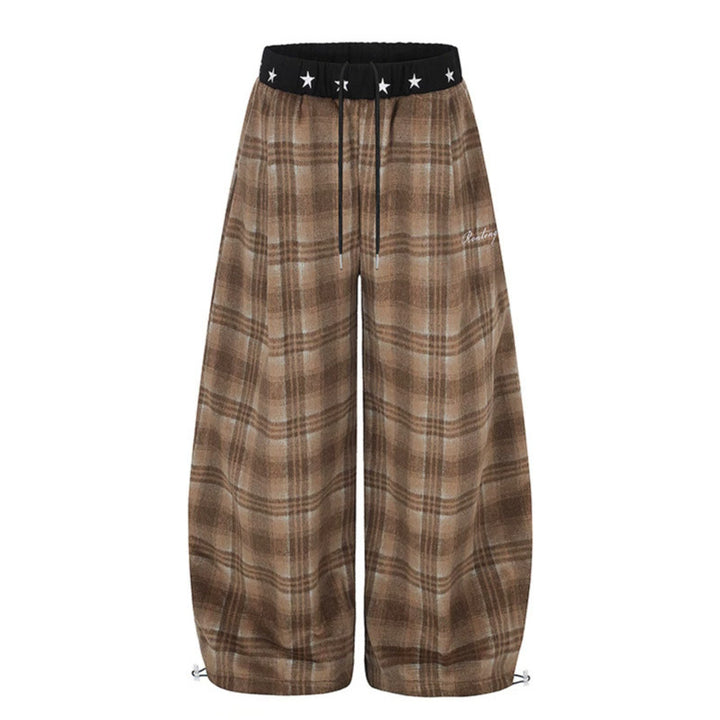 Women's Extra Wide Checked Palazzo Lounge Pants made of soft fleece with star-embellished comfort waistband, drawstring and adjustable hem.