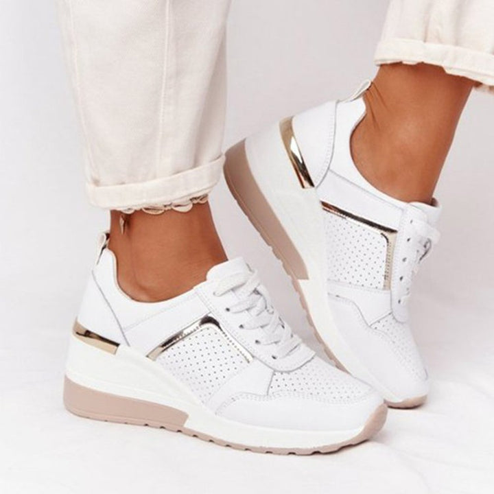 Women’s wedge sneakers with perforated upper material and metallic accent Mune Fashion