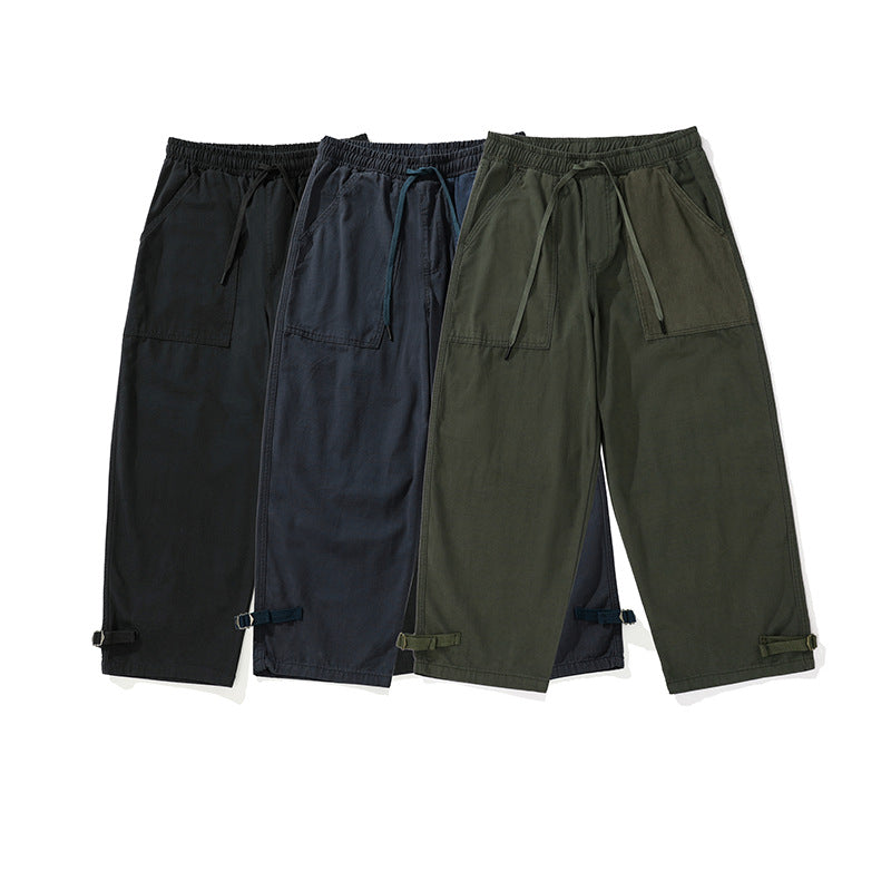Men's wide cropped cargo pants with elastic drawstring waistband, patch pockets and adjustable ankle straps Mune Fashion