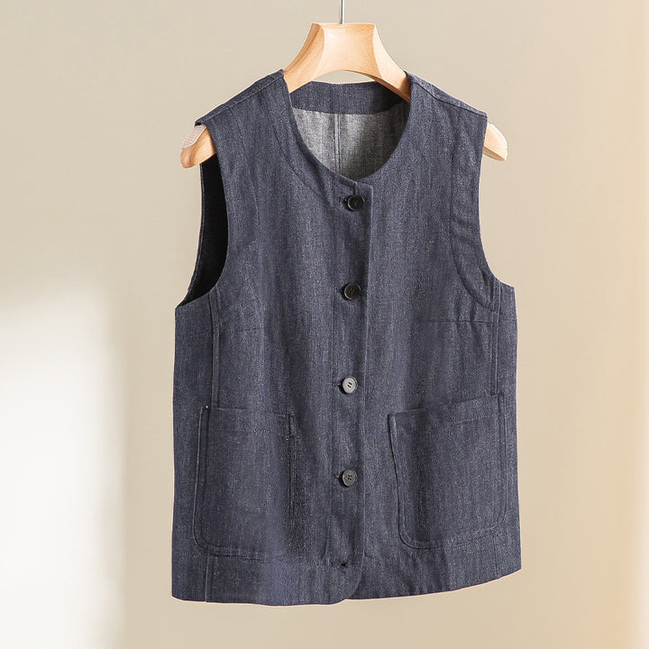 Women's sleeveless lightly tailored vest made of linen denim with button placket and patch pockets Mune Fashion