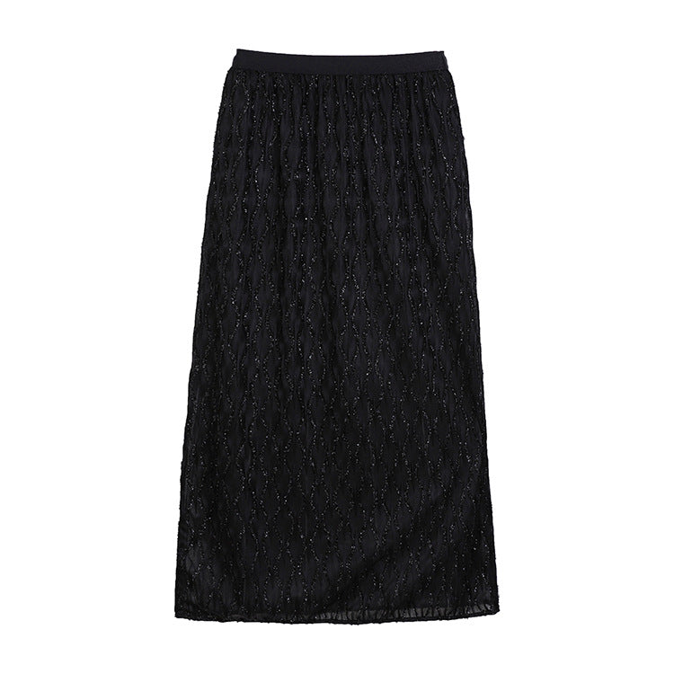 Women's embroidered midi maxi skirt with fine glitter mesh and elastic comfort waistband.