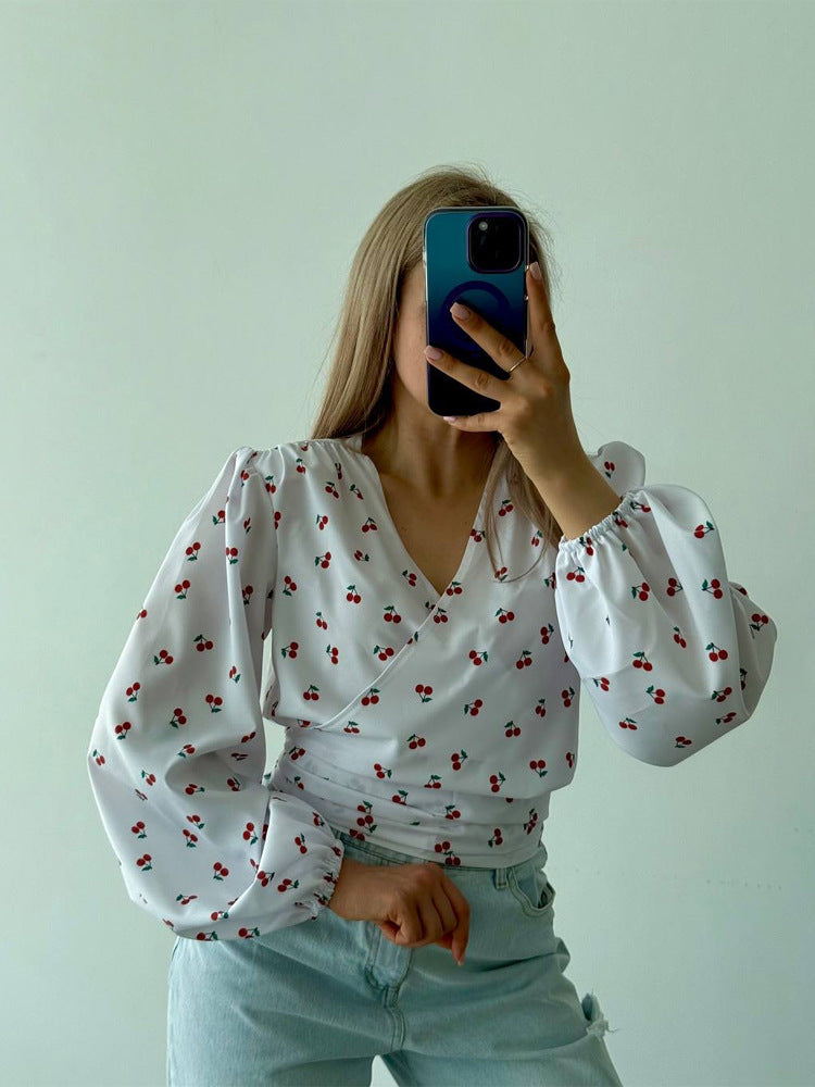 Women's wrap blouse with cherry print, wide puff sleeves & tie belt Mune Fashion