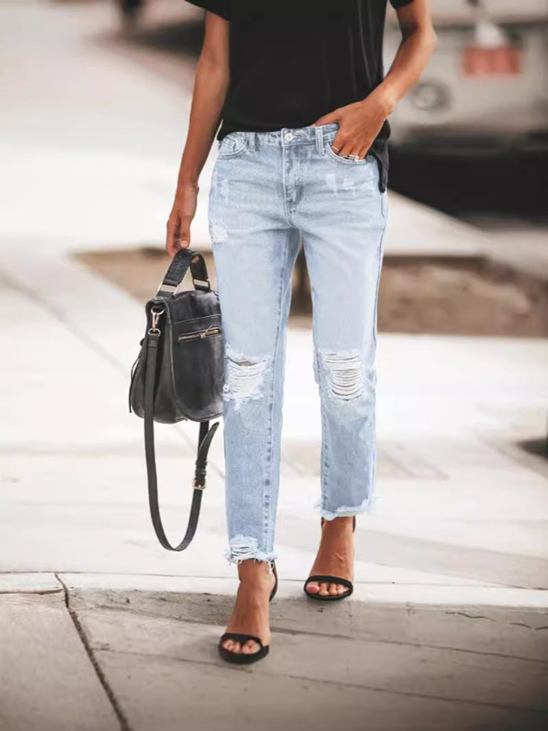 Women's Ripped Denim Jeans with Casual Cut and Frayed Hem Mune Fashion