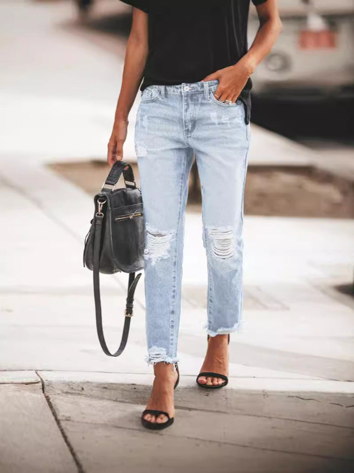 Women's Ripped Denim Jeans with Casual Cut and Frayed Hem Mune Fashion