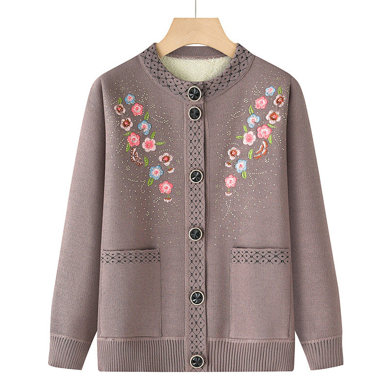 Women's embroidered cardigan with round neck, patch pockets, and decorative button placket Mune Fashion
