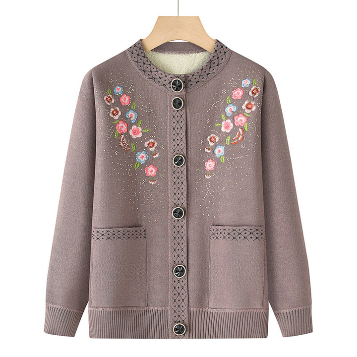 Women's embroidered cardigan with round neck, patch pockets, and decorative button placket Mune Fashion