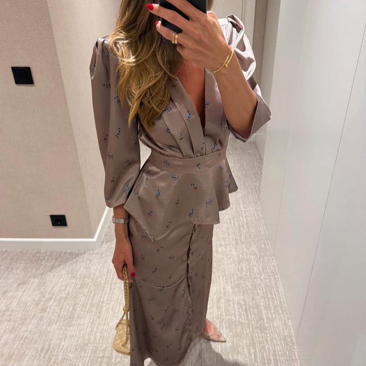 Women's satin two-piece set with tailored peplum top, deep V-neckline and button-up midi skirt Mune Fashion