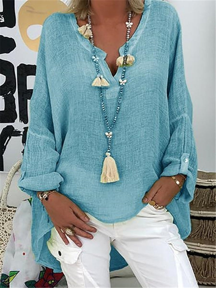 Ladies' nano structured cotton tunic in a loose fit with V-neck, rolled sleeves, and extended back hem Mune Fashion