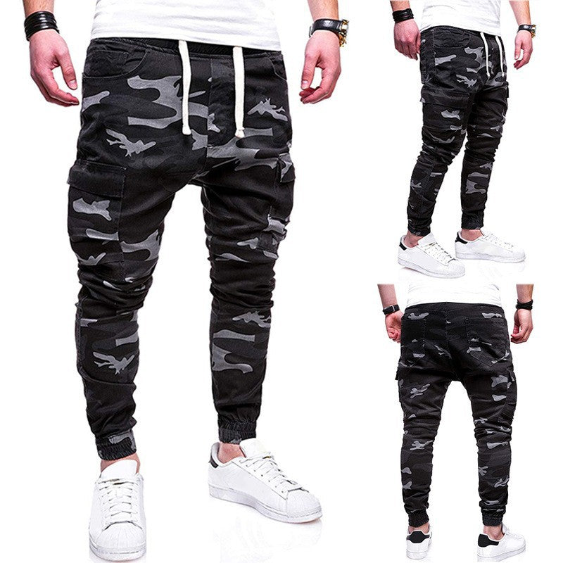 Men's tailored cargo jogger pants with elastic comfort waistband, side flap pockets, and tapered cuffs Mune Fashion