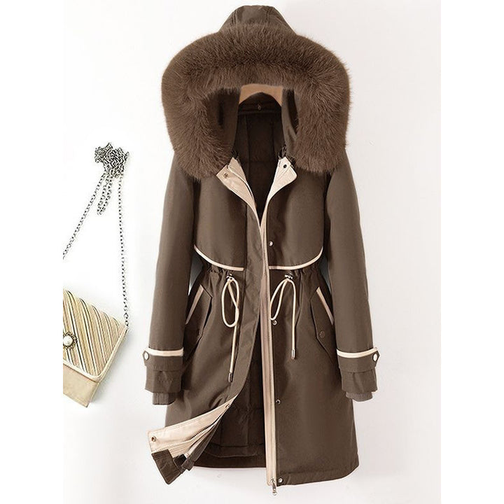 Women's long parka with faux fur hood, waist drawstring, and contrasting piping Mune Fashion