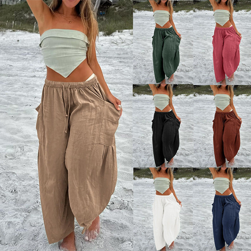 Women's wide palazzo pants made from a lightweight linen blend with drawstring and side pocket Mune Fashion