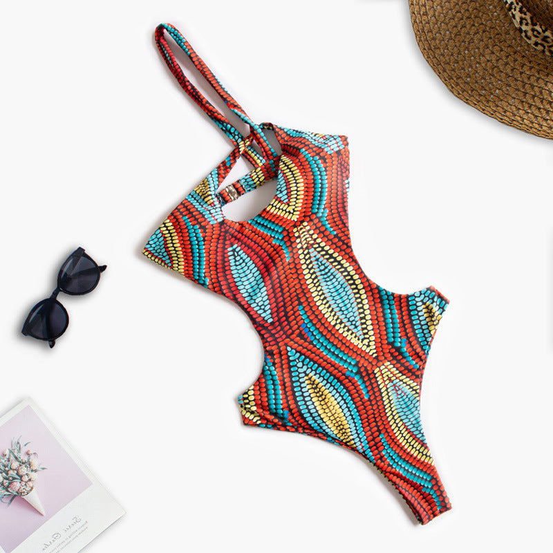 Women's One-Piece Swimsuit with Asymmetric Cut-Out and Floral Design Mune Fashion