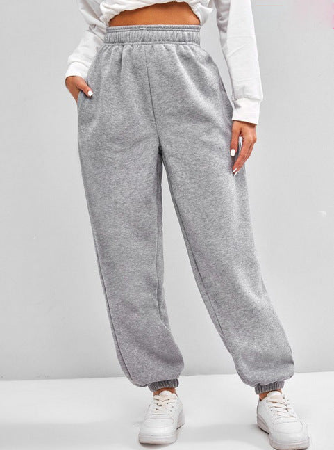 Women's high-cut Relax-Fit jogging pants with elastic waistband, side pockets, and gathered leg cuffs Mune Fashion