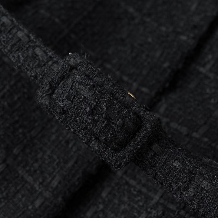 Ladies short jacket made of bouclé tweed with round neck, golden decorative buttons and tie belt Mune Fashion
