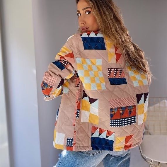 Women's quilted patchwork jacket with stand-up collar and flap pockets Mune Fashion