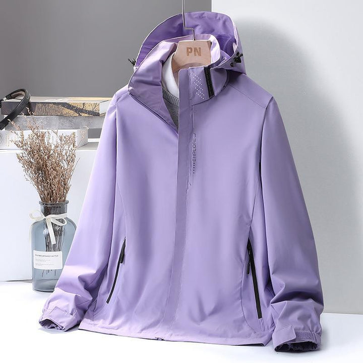 Women's Lightweight Softshell Hooded Jacket with Windproof Storm Flap and Concealed Zipper Pockets Mune Fashion