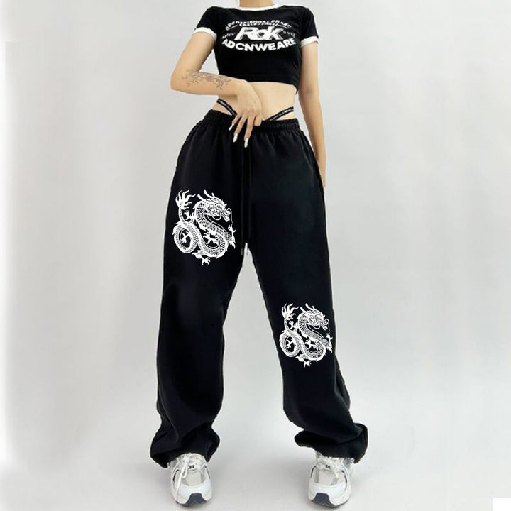 Women's high-waisted jogging pants with side statement print and elastic waistband Mune Fashion