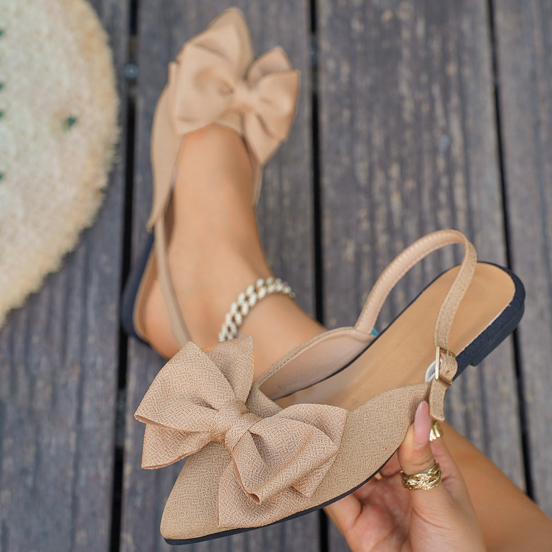 Ladies elegant lace ballerinas with large decorative bow and shimmering upper material Mune Fashion