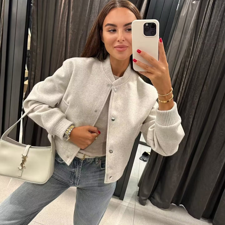 Women's padded bomber jacket made of wool blend with snap button placket, ribbed collar, and side slit pockets Mune Fashion