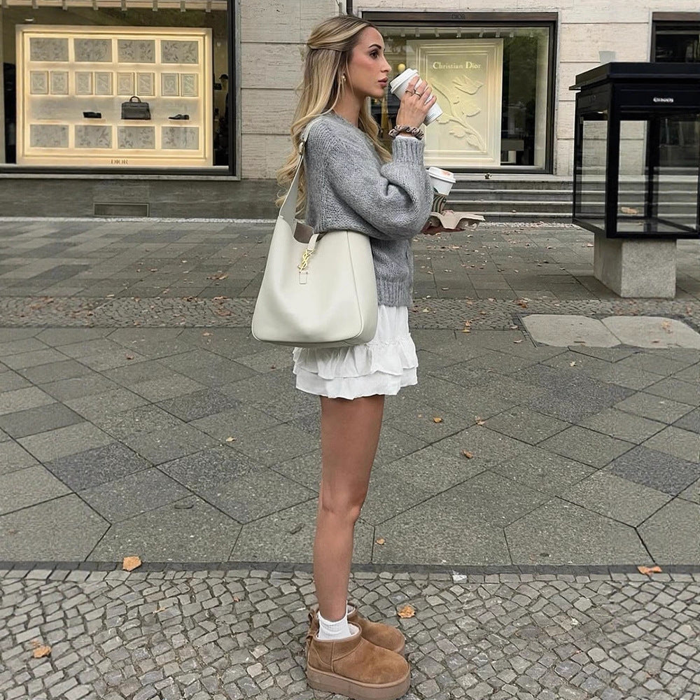 Women's cropped chunky knit cardigan with oversized balloon sleeves and visible button placket Mune Fashion