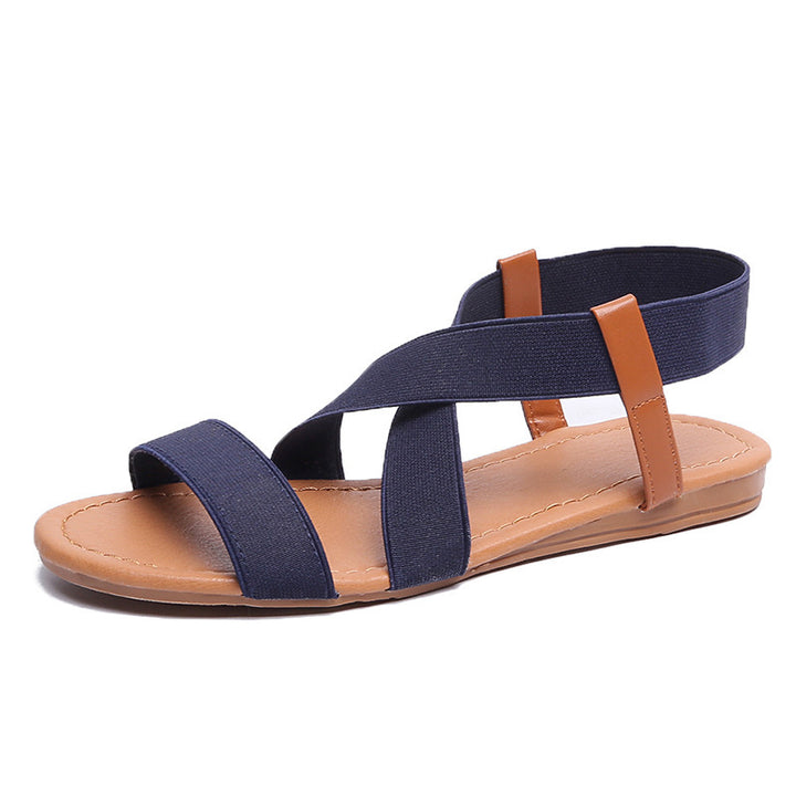 Women's flat elastic strap sandals with crossed stretch bands and padded comfort footbed Mune Fashion