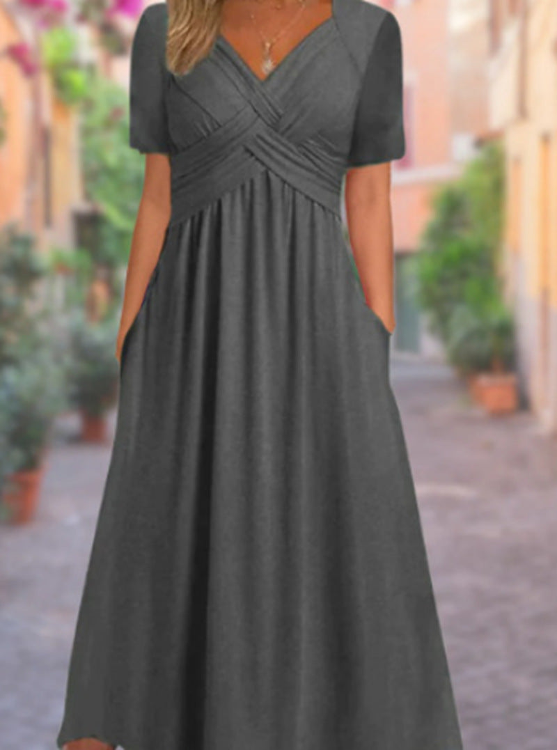 Women's flowing maxi dress with crossed yoke V-neck short sleeves and side pockets Mune Fashion