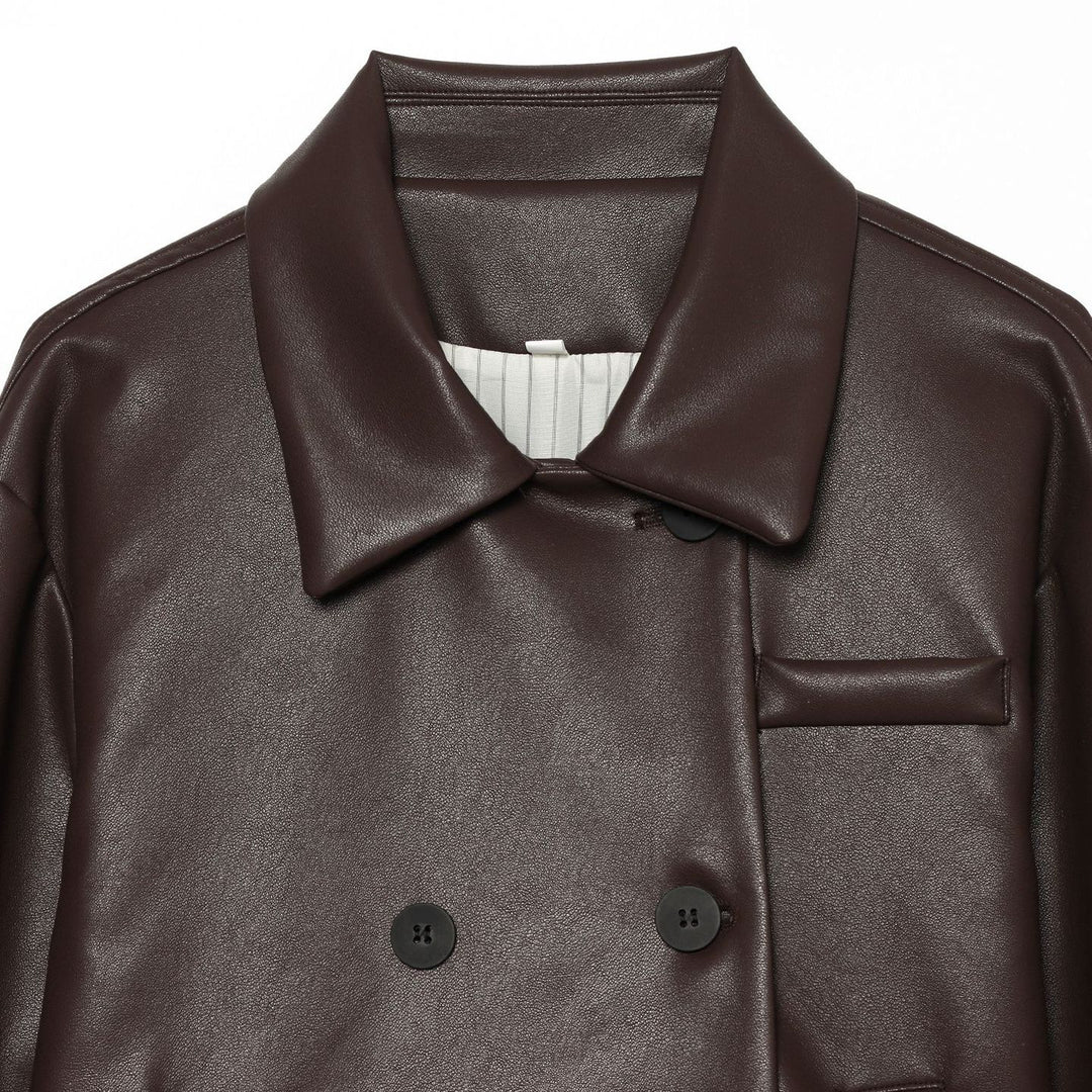 Women's double-breasted cropped coat made of faux leather with a large lapel collar and flap pockets Mune Fashion