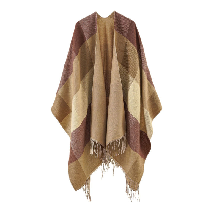 Women’s web cape in a boxy ruana cut with diagonal check pattern and fringes