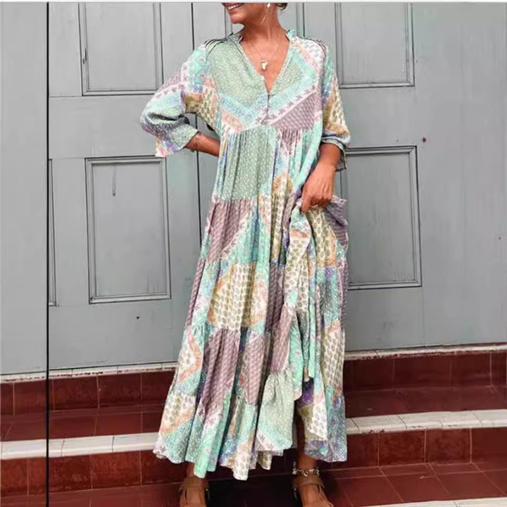 Women's airy maxi dress in patchwork boho style with V-neck, gathered bodice, and flared tiered hem Mune Fashion
