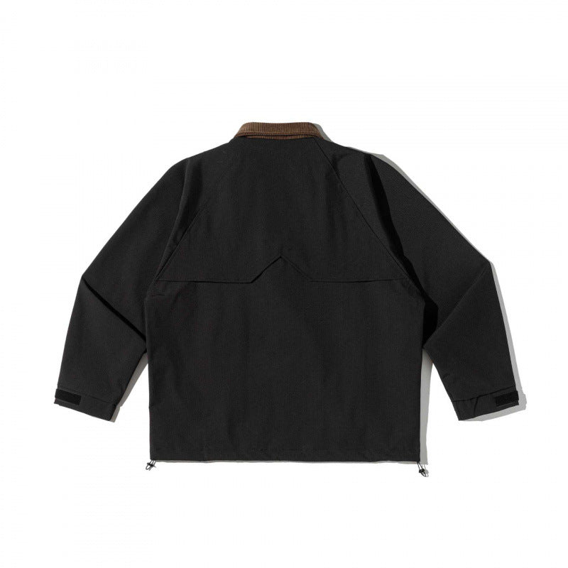 Unisex boxy overshirt jacket in utility style with cord collar, flap pockets and drawstring hem Mune Fashion