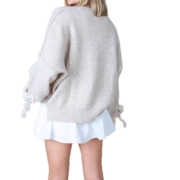 Ladies' Fashionable Sweater with Decorative Knot Design