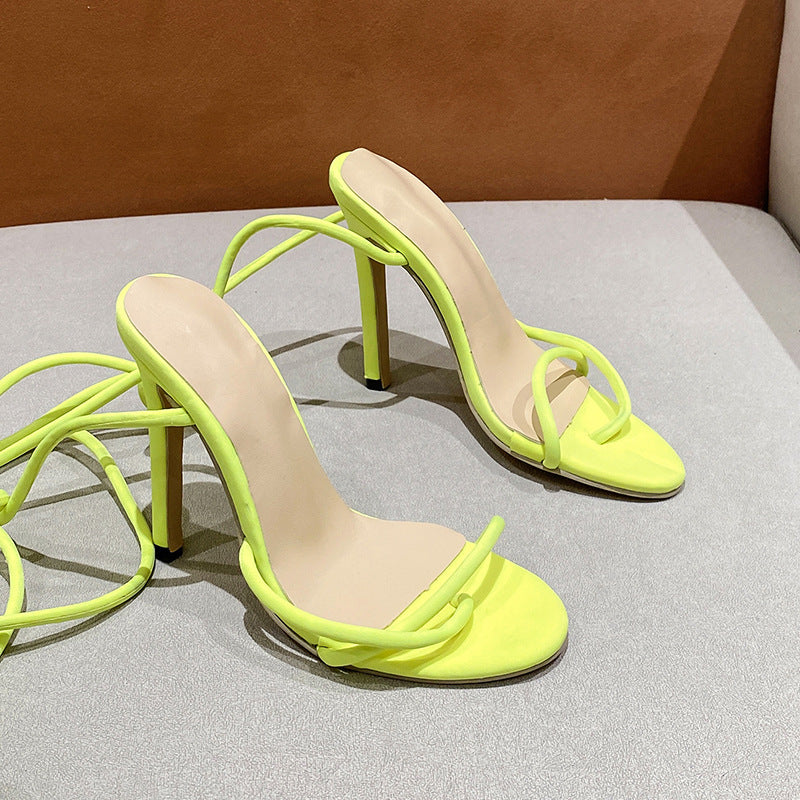 Women's ankle strap sandals with twisted lace straps, slim stiletto heel, and padded comfort footbed Mune Fashion