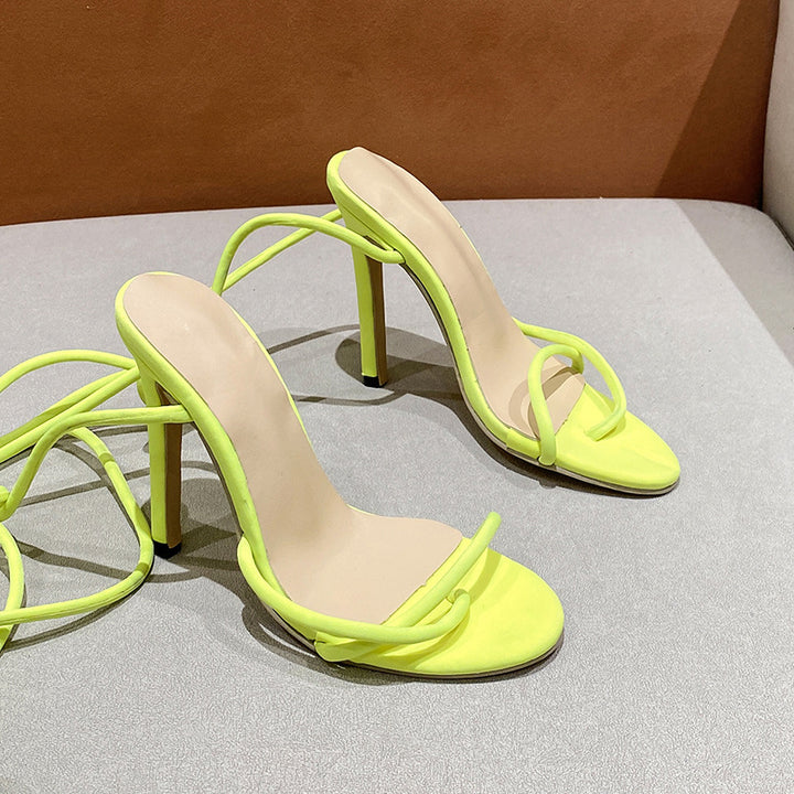 Women's ankle strap sandals with twisted lace straps, slim stiletto heel, and padded comfort footbed Mune Fashion