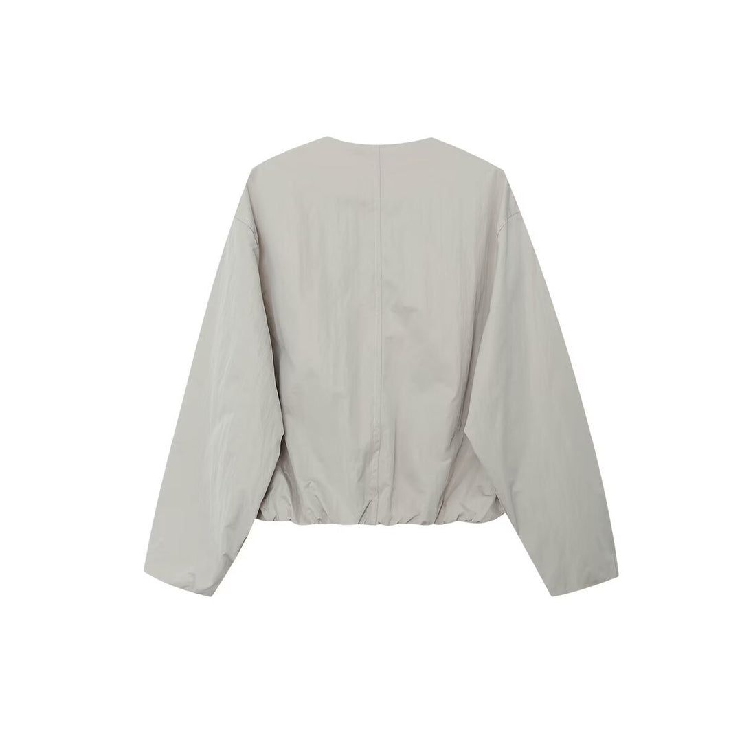 Women's lightweight utility blouson jacket with round neckline, snap button placket and large patch pockets Mune Fashion