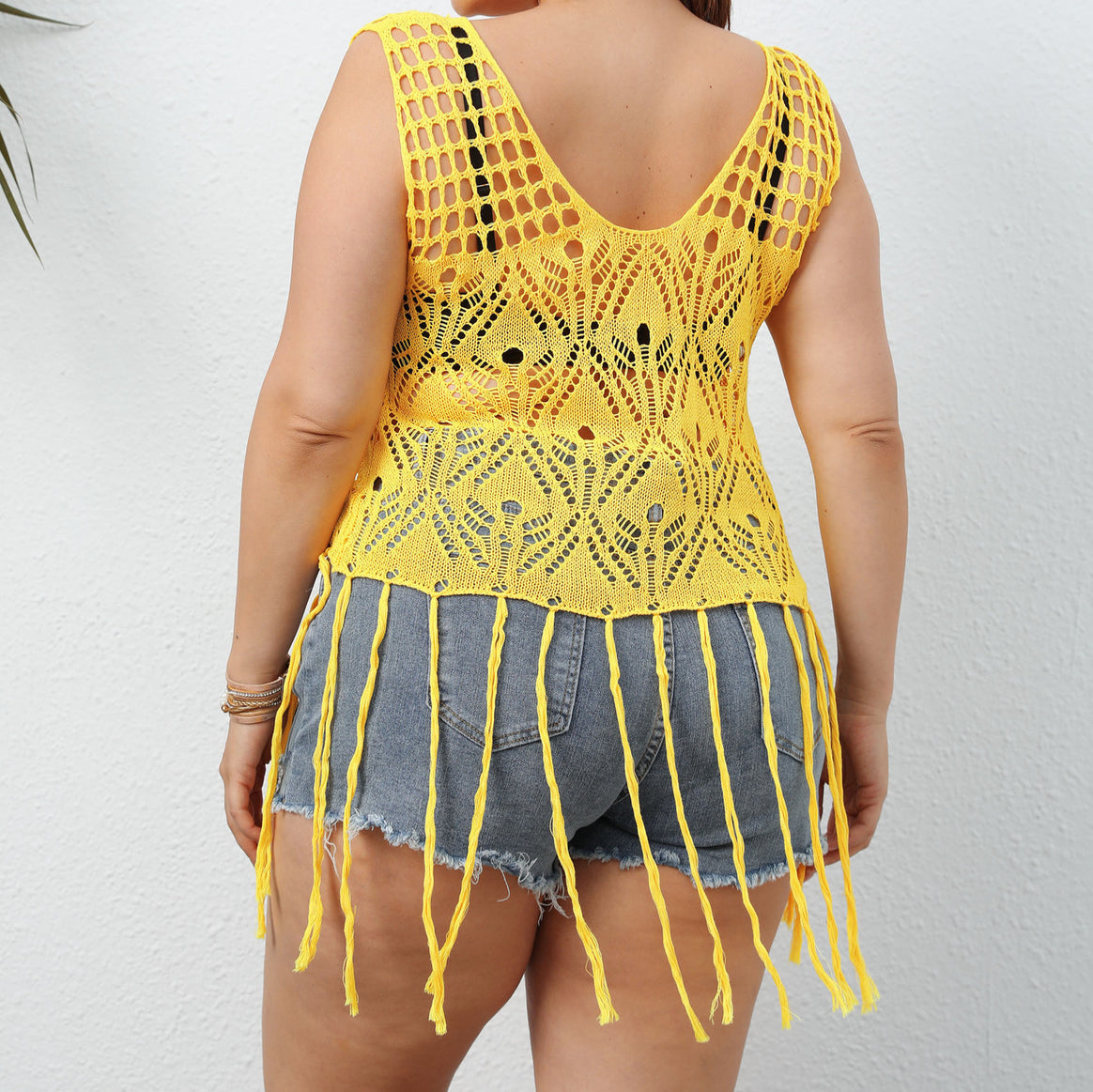 Ladies crocheted, airy beach top with fringed accents Mune Fashion