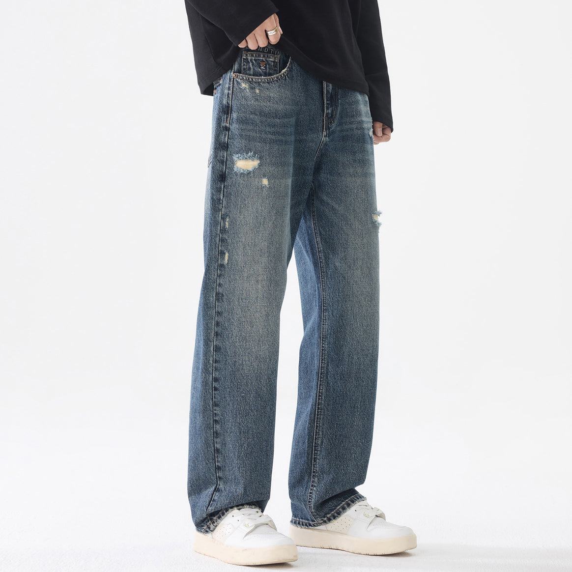 Men's loosely cut baggy jeans made of robust denim with distressed details Mune Fashion