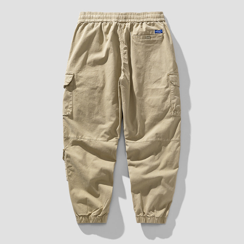 Herren Leichte Canvas-Cargohose im Joggerstil mit elastischem Bund, segmentierten Kniepaneelen und verdeckten Klappentaschen Mune Fashion