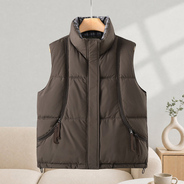 Women's quilted thermal vest with high stand-up collar, side zipper pockets, and adjustable hem Mune Fashion