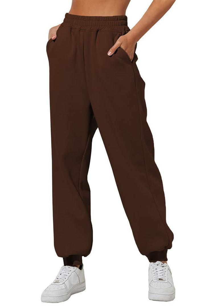 Women's wide High-Waist jogging pants with soft creases, elastic comfort waistband, and ribbed ankle cuffs Mune Fashion
