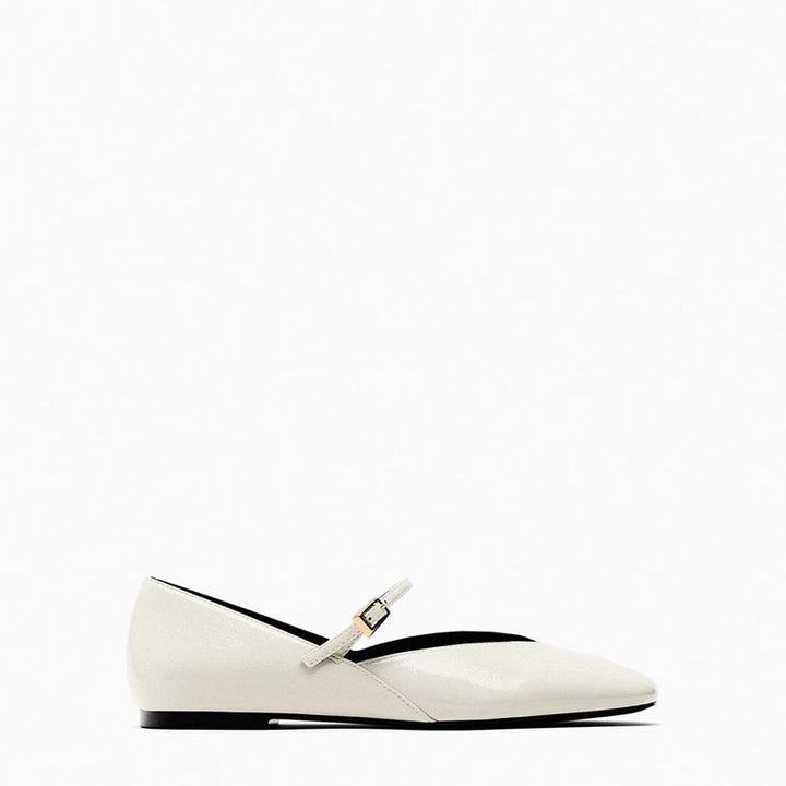 Women's elegant patent leather Mary Jane ballerina flats with a fine metal buckle and pointed toe cap.